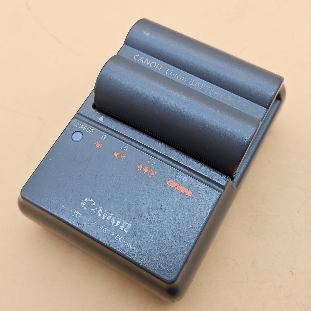 Genuine Canon Charger CG-580 + OEM Battery